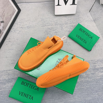 BOTTEGA VENETA 26S SLIP-ONS IN ORANGE FABRIC WITH RUBBER SOLE
