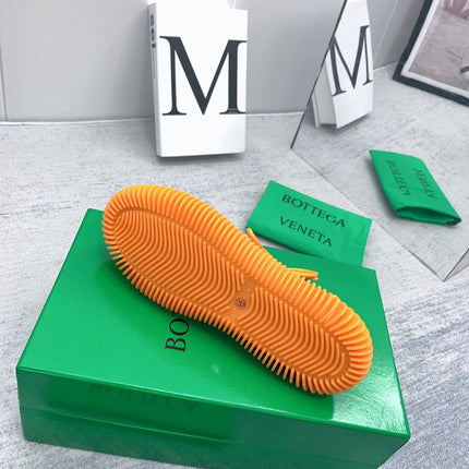 BOTTEGA VENETA 26S SLIP-ONS IN ORANGE FABRIC WITH RUBBER SOLE