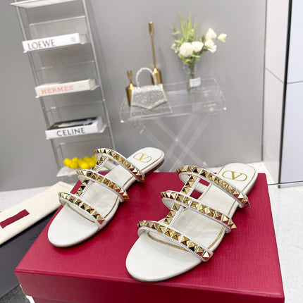 VALENTINO 26S ROCKSTUD STRAPPY FLAT SLIDE SANDALS IN WHITE CALFSKIN GOLD HARDWARE
