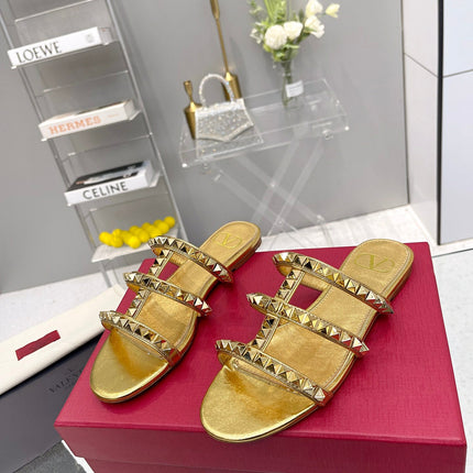 VALENTINO 26S ROCKSTUD STRAPPY FLAT SLIDE SANDALS IN GOLD CALFSKIN