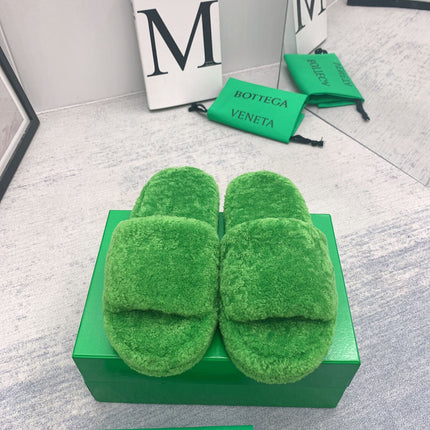 BOTTEGA VENETA 26S PLATFORM SLIDES IN GREEN SHEARLING