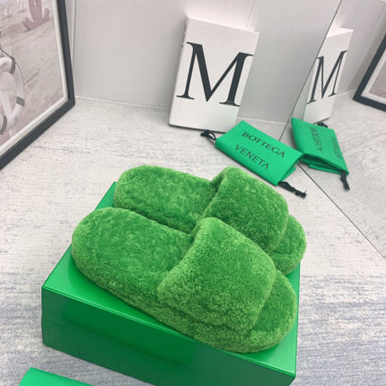 BOTTEGA VENETA 26S PLATFORM SLIDES IN GREEN SHEARLING