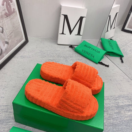 BOTTEGA VENETA 26S SLIDES IN ORANGE FABRIC