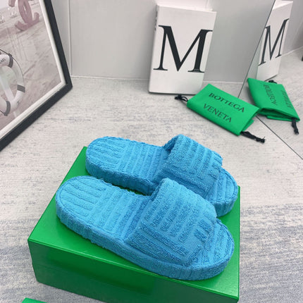 BOTTEGA VENETA 26S SLIDES IN SKY BLUE FABRIC