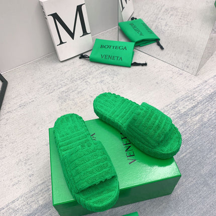 BOTTEGA VENETA 26S SLIDES IN GREEN FABRIC