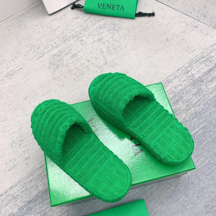 BOTTEGA VENETA 26S SLIDES IN GREEN FABRIC