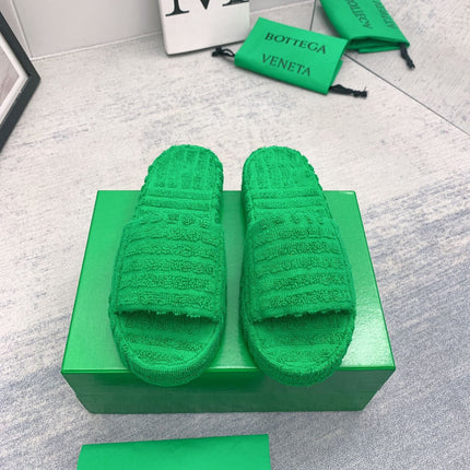BOTTEGA VENETA 26S SLIDES IN GREEN FABRIC