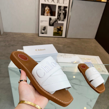 WOODY MULE IN WHITE LAMBSKIN WITH EMBROIDERED LOGO