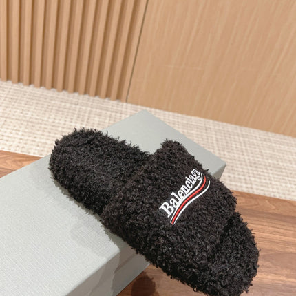 FURRY SLIDES IN BLACK CURLY SHEARLING