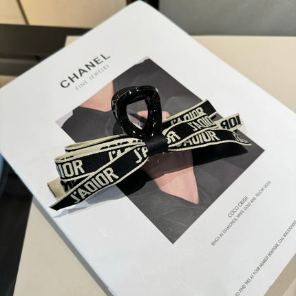 DIOR 26S BOW HAIR CLIP IN BLACK ACETATA 500564