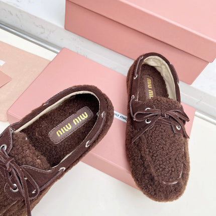 MIUMIU 26S BOAT LOAFERS IN DARK BROWN SHEARLING
