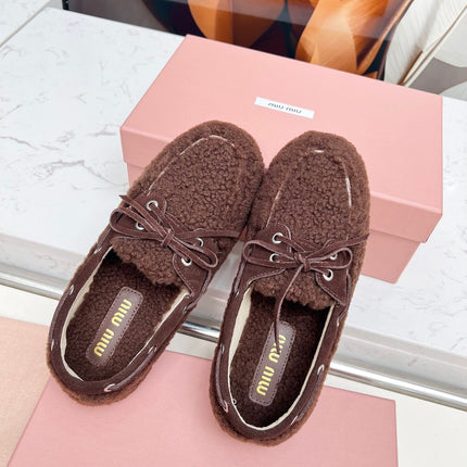 MIUMIU 26S BOAT LOAFERS IN DARK BROWN SHEARLING