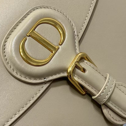 DIOR 26S MEDIUM SADDLE IN BEIGE CALFSKIN WITH GOLD-TONE HARDWARE