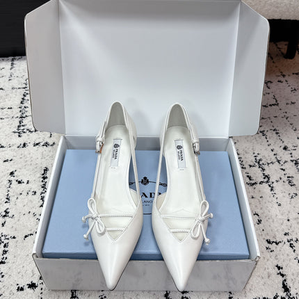 PRADA 26S POINTED-TOE HIGH HEELS 55MM IN WHITE CALFSKIN WITH BOW