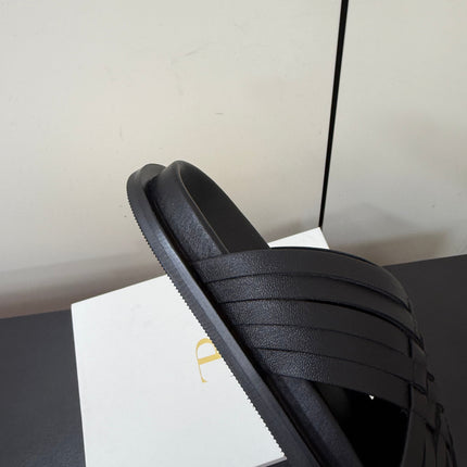 THE ROW 26S CROSS STRAP SANDALS IN BLACK CALFSKIN
