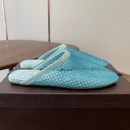 ALAIA 26S FLAT MULES IN BLUE SUEDE AND MESH RHINESTONE-EMBELLISHED
