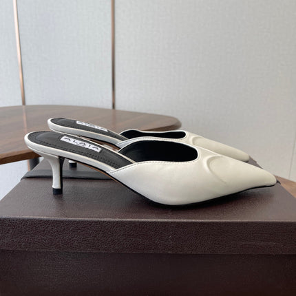 ALAIA 26S HEELED MULES 50 MM IN WHITE FABRIC