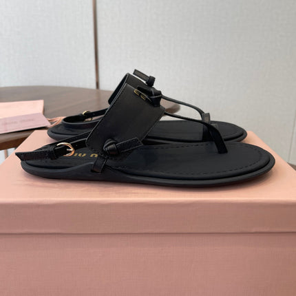 MIUMIU 26S FLIP FLOPS IN BLACK CALFSKIN
