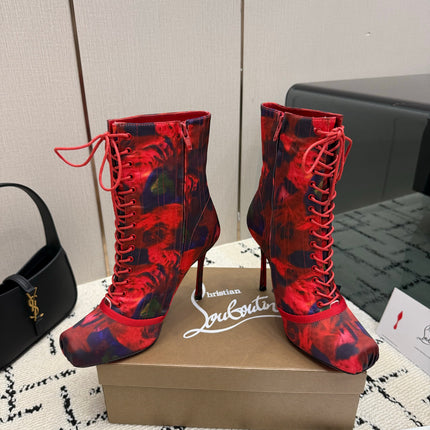 CHRISTIAN LOUBOUTIN 26S LACE-UP HEEL BOOTS 100 MM IN RED MIX PURPLE FLORAL PRINT SATIN