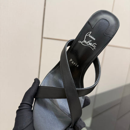 CHRISTIAN LOUBOUTIN 26S CROSS-STRAP HIGH HEEL SANDALS 105 MM IN BLACK CALFSKIN