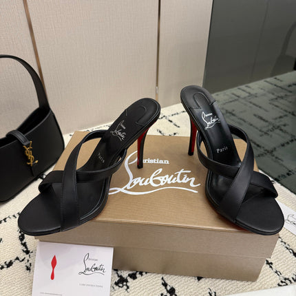 CHRISTIAN LOUBOUTIN 26S CROSS-STRAP HIGH HEEL SANDALS 105 MM IN BLACK CALFSKIN