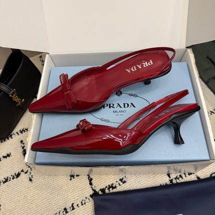 PRADA 26S BUCKLE STRAP SLINGBACK PUMPS IN DARK RED PATENT CALFSKIN WITH BOW