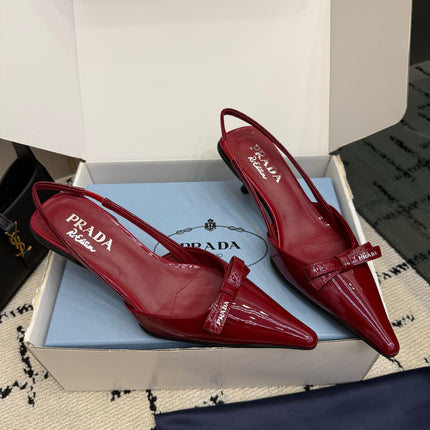 PRADA 26S BUCKLE STRAP SLINGBACK PUMPS IN DARK RED PATENT CALFSKIN WITH BOW