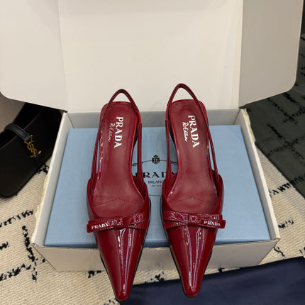 PRADA 26S BUCKLE STRAP SLINGBACK PUMPS IN DARK RED PATENT CALFSKIN WITH BOW