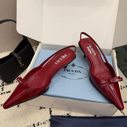 PRADA 26S BUCKLE STRAP SLINGBACK PUMPS IN DARK RED PATENT CALFSKIN WITH BOW