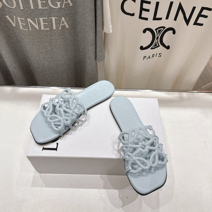LOEWE 26S PETAL ANAGRAM SLIDE IN LIGHT BLUE CALFSKIN