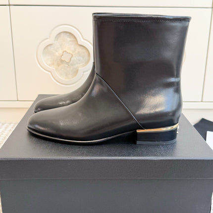 CHANEL 26S SHORT BOOTS IN BLACK CALFSKIN