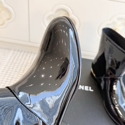 CHANEL 26S SHORT BOOTS IN BLACK PATENT LEATHER