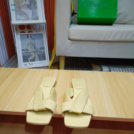 BOTTEGA VENETA 26S FLAT SLIDES IN LIGHT YELLOW LAMBSKIN