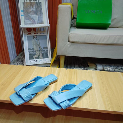 BOTTEGA VENETA 26S FLAT SLIDES IN SKY BLUE LAMBSKIN