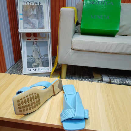 BOTTEGA VENETA 26S FLAT SLIDES IN SKY BLUE LAMBSKIN