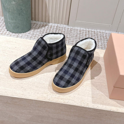 MIUMIU 25S SLIP-ON BOOTIES IN BLACK AND BLUE WOOL WITH SHEARLING