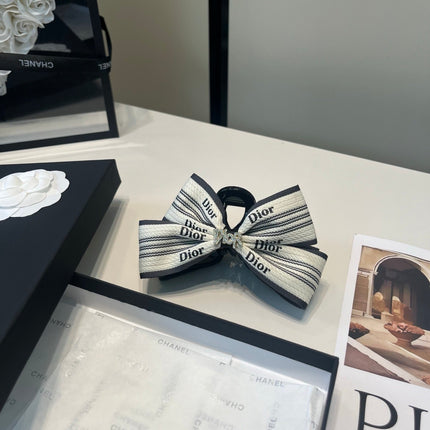 DIOR 26S BOW HAIR CLIP IN WHITE AND BLACK FABRIC 512124