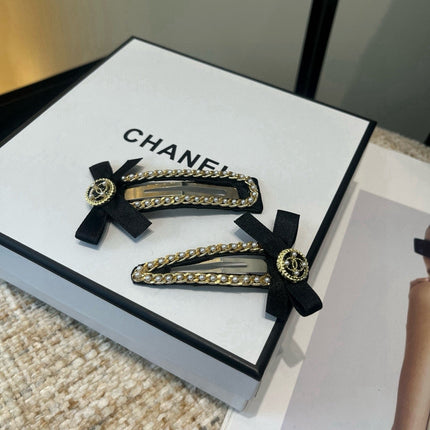 CHANEL 26S BOW HAIR CLIP IN BLACK FABRIC 505310