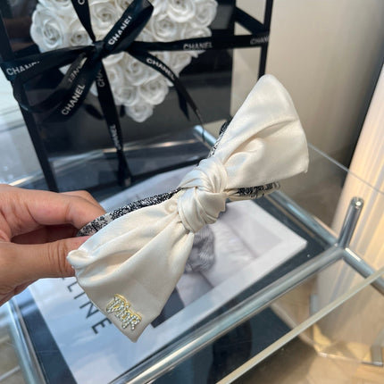 DIOR 26S BOW HEADBAND IN WHITE SATIN 500642