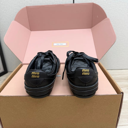MIUMIU 26S BUCKLE SNEAKERS IN BLACK CALFSKIN WITH GOLD HARDWARE
