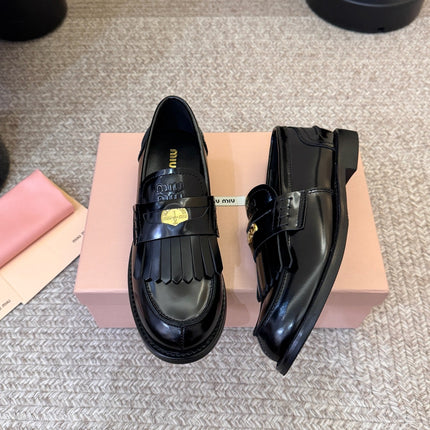 MIUMIU 26S FRINGE PENNY LOAFERS IN BLACK CALFSKIN