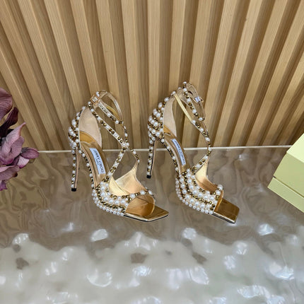 JIMMY CHOO 26S HEEL SANDALS 105 MM IN METALLIC GOLD LEATHER AND WHITE PEARLS