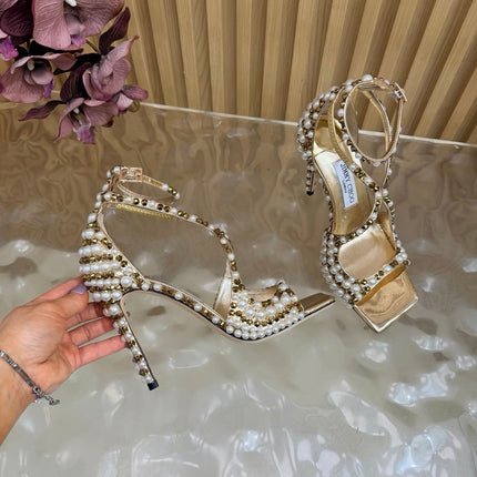 JIMMY CHOO 26S HEEL SANDALS 105 MM IN METALLIC GOLD LEATHER AND WHITE PEARLS