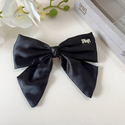 DIOR 26S BOW HAIR CLIP IN BLACK SILK 500720