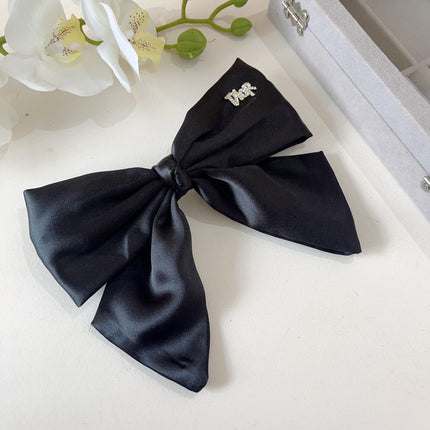 DIOR 26S BOW HAIR CLIP IN BLACK SILK 500720