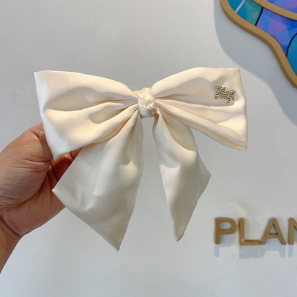 DIOR 26S BOW HAIR CLIP IN WHITE SILK 500721