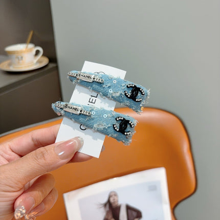 CHANEL 26S HAIR CLIP IN LIGHT BLUE DENIM 505293