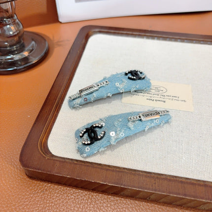 CHANEL 26S HAIR CLIP IN LIGHT BLUE DENIM 505293