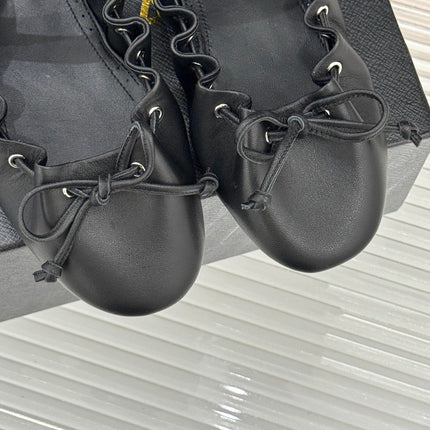 ALAIA 26S MARY JANE FLATS IN BLACK LAMBSKIN WITH BOW