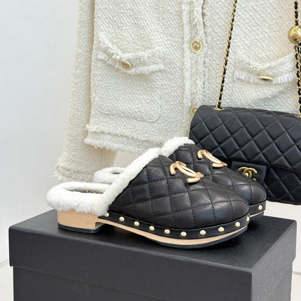 CHANEL 26S QUILTED SHEARLING LINED CLOG MULES IN BLACK CALFSKIN GOLD HARDWARE